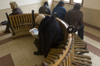 Poland - Krakow: commuters waiting inside the railway station (photo by M.Gunselman)