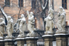 Poland - Krakow: statues in front of St. Barbara's church - sunrise (photo by M.Gunselman)