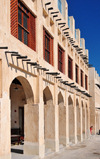 Doha, Qatar: arches at Souq Waqif, meaning 'standing market' in Arabic, a labyrinth of narrow streets, the place to buy spices, dried fruit, nuts, perfumes, honey, ouds, incense, pots, Bedouin weaving, gypsum handicrafts, model dhows... - photo by M.Torres