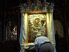 Trgu Neamt area, Neamt county, Moldavia, Romania: Neamt Monastery - man kisses the miracle-maker holy icon of the Virgin and baby Jesus - photo by J.Kaman