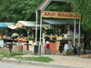 Russia - Udmurtia - Izhevsk: market - fruit stalls and welcome sign - photo by P.Artus