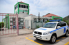 Flat Point, Saba: Juancho E. Yrausquin Airport - terminal building, control tower and police car - Toyota - photo by M.Torres