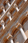 Cagliari, Sardinia / Sardegna / Sardigna: Cathedral of Saint Mary - neo-Pisan-Romanesque style gable using limestone from Bonaria hill and sculptural fragments of the original faade - pilasters and hanging arches - Cattedrale di Santa Maria di Castello - Duomo - quartiere Castello - photo by M.Torres