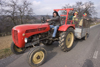 tractor in a Pust parade - a traditional celebration where people dress up to scare off the winter - Fokovci, Prekmurje, Slovenia - photo by I.Middleton