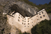 Predjama castle from below, Slovenia - photo by I.Middleton