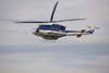 Slovenia - Brnik Airport: Slovenian Police Agusta Bell AB.412 S5-HPA helicopter patrolling Ljubljana Joze Pucnik Airport - photo by I.Middleton