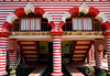 Colombo, Sri Lanka: candy striped ablutions pond - man performs wudu - Jami-Ul-Alfar Mosque - Pettah - photo by M.Torres