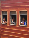 Colombo, Sri Lanka: passengers on a 3rd class carriage - train at Colombo Fort Railway Station - photo by M.Torres