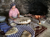 Turkey - Selcuk / Seljuk Selcuk: gozleme maker: gozleme maker - photo by R.Wallace