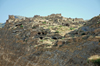 Hasankeyf / Heskif, Batman Province, Southeastern Anatolia, Turkey: the cliffs over the Tigris have caves once used churches but also tombs and dwellings - photo by W.Allgwer