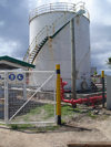 Funafuti atoll, Tuvalu: fuel storage tank in the harbour - photo by G.Frysinger