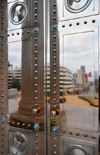 Little Rock, Arkansas, USA: Arkansas State Capitol - detail of a bronze door reflecting Capitol Avenue - the doors were came from Tiffany's in New York - photo by M.Torres