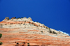 Zion National Park, Utah, USA: this Navajo Sandstone hill originates in old sand dunes, shifting winds during deposition created cross-bedding leading to today's striation - Zion-Mt. Carmel Highway - photo by M.Torres