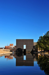 Oklahoma City, OK, USA: Oklahoma City National Memorial - reflecting pool and one of the bronze gates called 'The Gates of Time' - photo by M.Torres