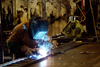 Las Vegas (Nevada): worker welding (photo by G.Friedman)