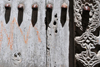 Stone Town, Zanzibar, Tanzania: detail of a magnificent carved door with large metal spikes - Mizingani Road - photo by M.Torres